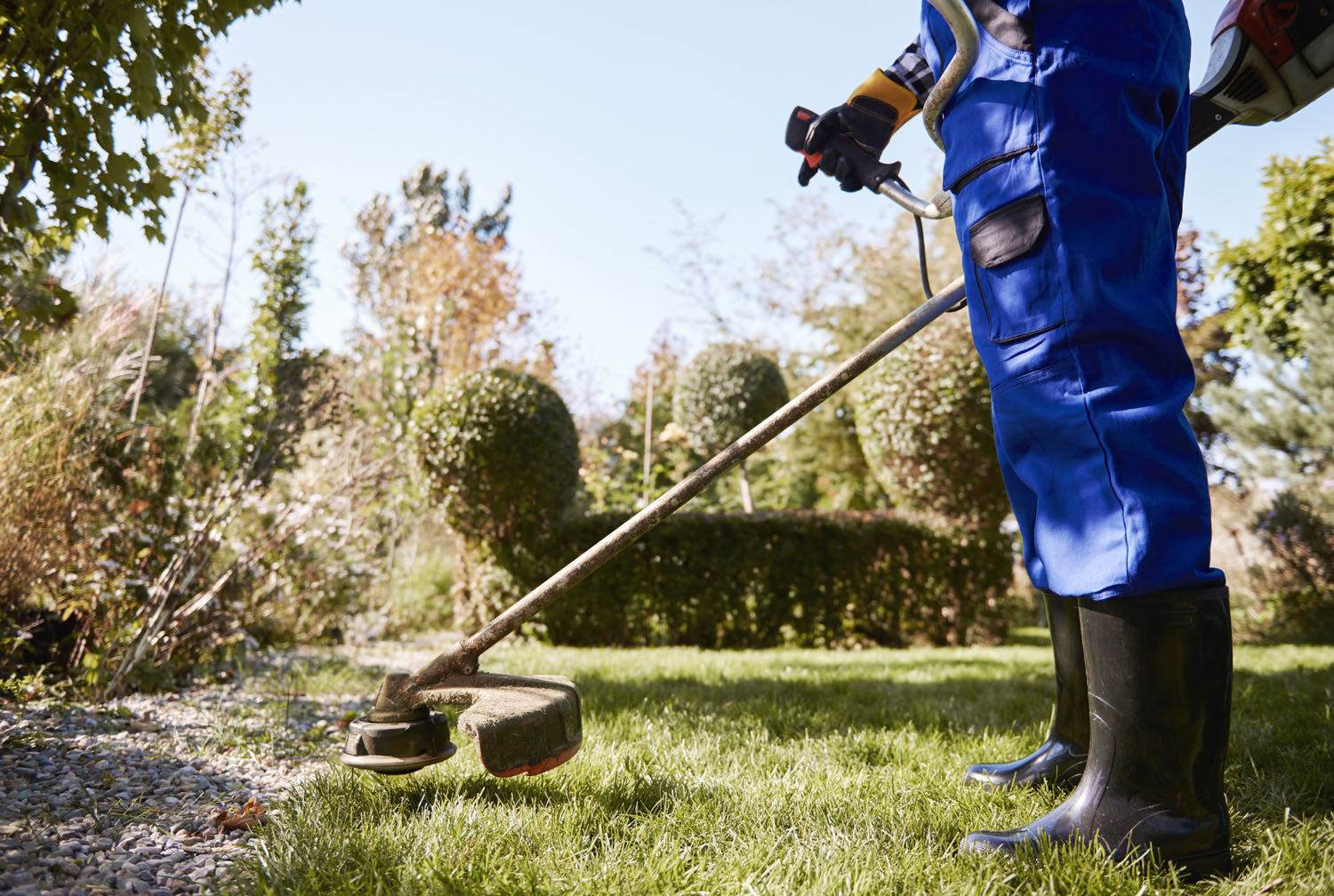 What are the hazards of using a strimmer?