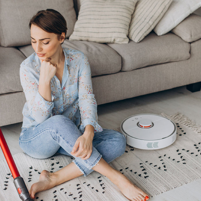 What is the difference between a carpet cleaner and a vacuum cleaner?