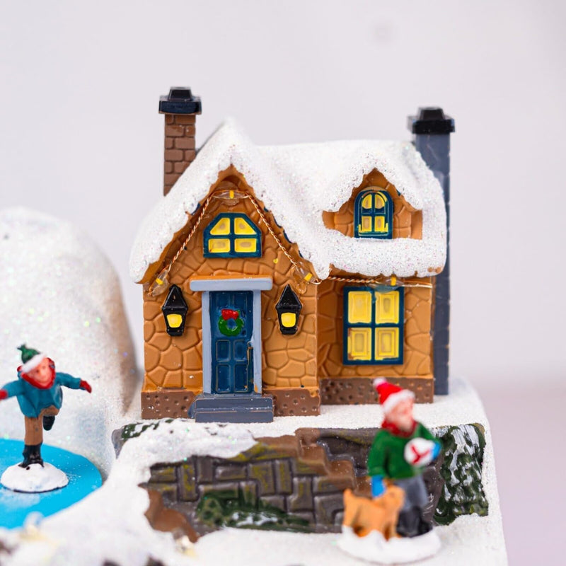 18cm Winter Village Scene with Ice Rink Christmas Decoration