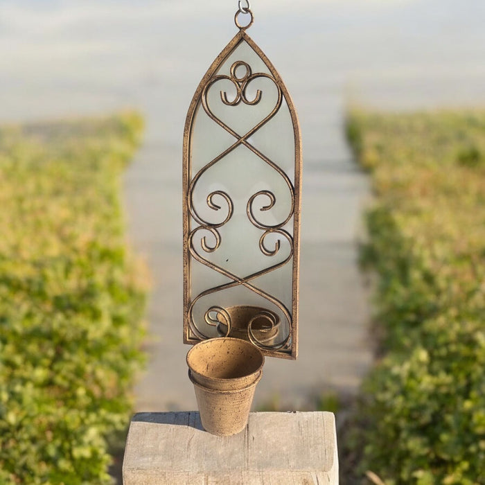 56cm RUSTY WALL MIRROR WITH SINGLE PLANTER