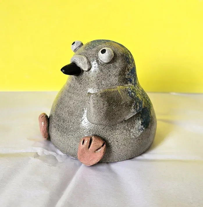Pigeon with Sign