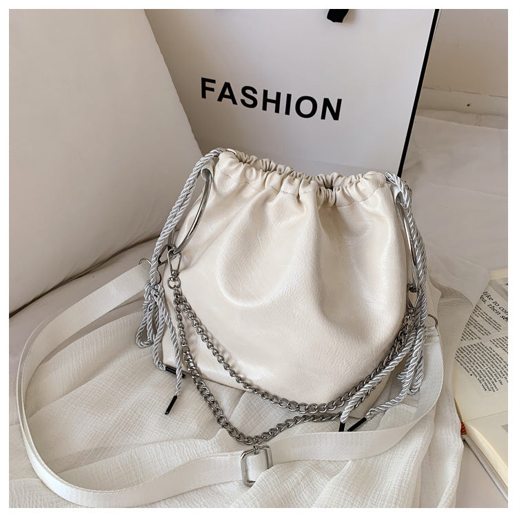 Pleated portable shoulder bag