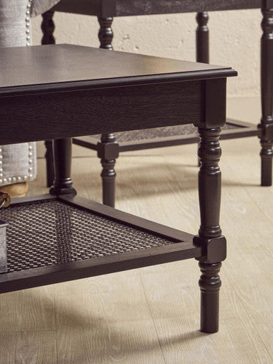 Black Wooden Coffee Table with Cane Webbed Lower Shelf and Carved Spindle Legs | Heritage