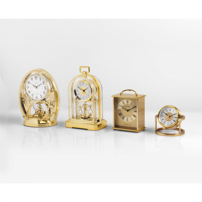 Rhythm Cont Mantel Clock Gilt Arch Anivers Sty Oblong Handle