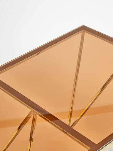 Red-Tinted Tempered Glass Top Coffee Table with Geometric Prismatic Champagne Metal Legs | Allure