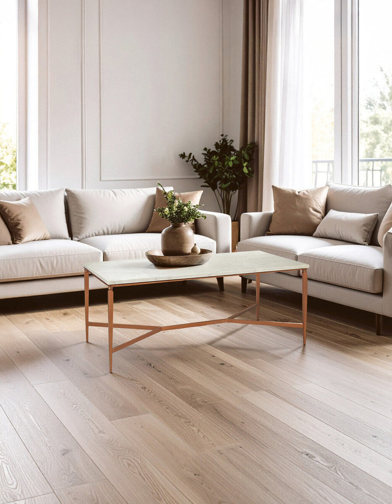 White Marble Top Coffee Table with Warm Copper Tapered Iron Legs | Nirav