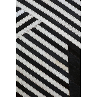 Bosie Large Black and White Hair on Leather Rug | Safira