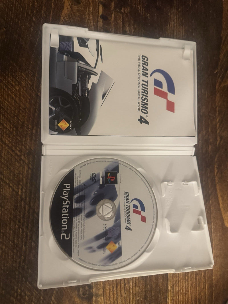 Sony PlayStation 2 Grab Turismo 4 The Real Driving Simulator Game
