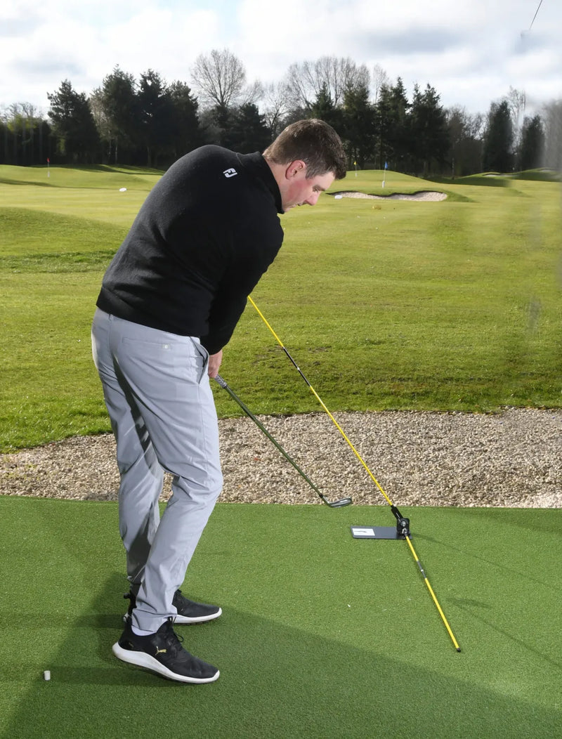 The Swing Plate® Golf Swing Trainer with Alignment Stick