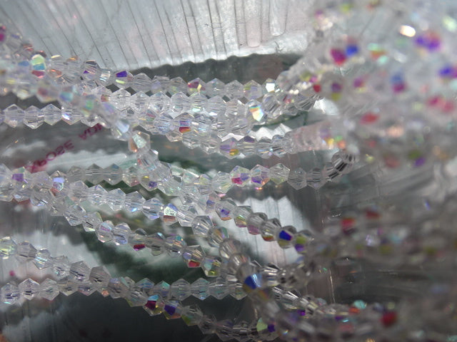 'Rainbow Crystal'   Half Electroplated Ab Rainbow Bicones 3.5 - 3.8 x 3mm
