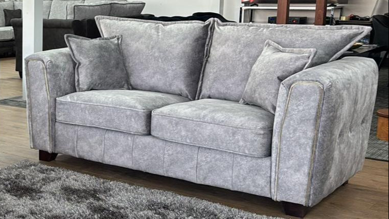 Serena 2 Seater Sofa: Modern Quilted Design, Chic Metal Trim Accents