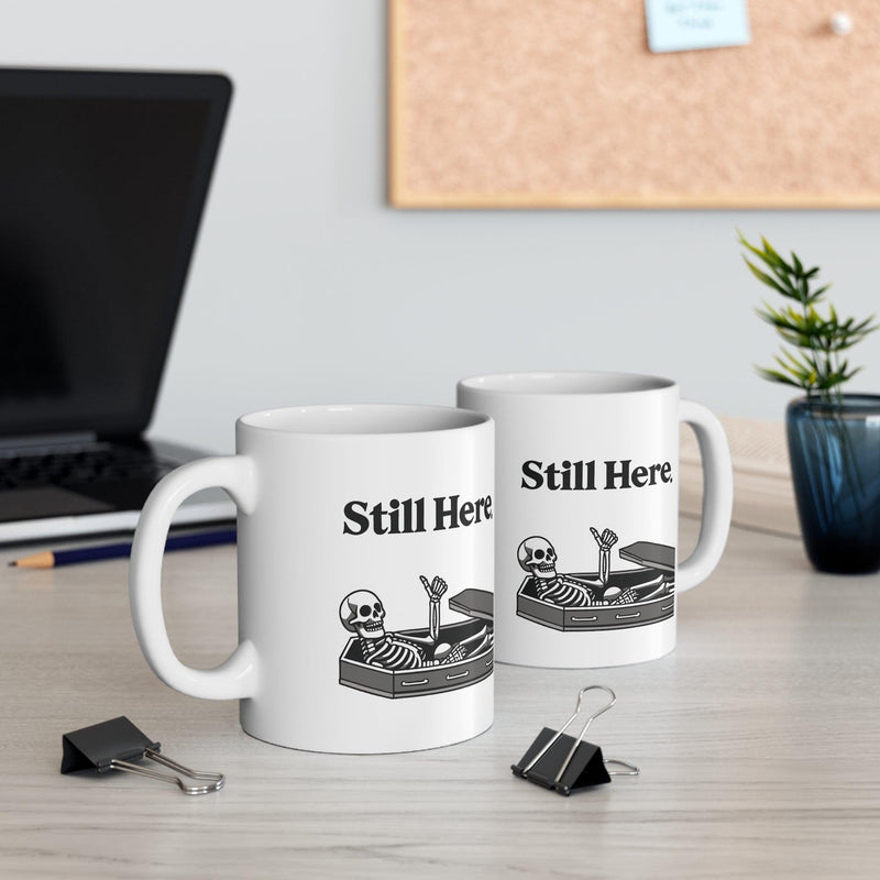 Still Here Skeleton Mug – Funny Resilience Coffee Cup