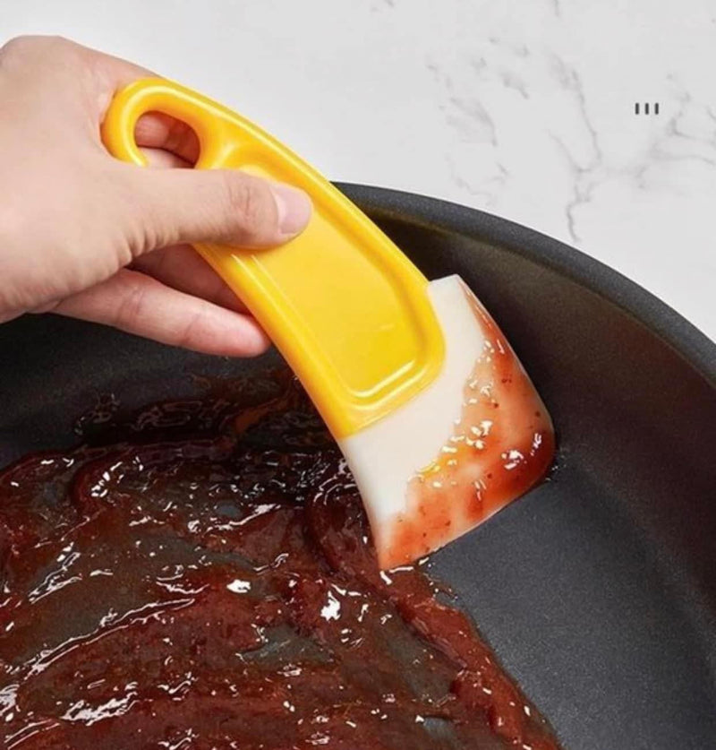 Yellow cooking / cleaning spatula