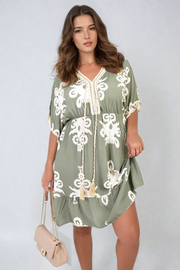 ikrush-aubrey-printed-v-neck-short-sleeve-midi-dress-with-tassel-detail-1712682043-DSC5335.png