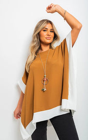 ikrush-laura-oversized-contrast-hem-flare-sleeve-top-1694088910-DSC3457.jpg