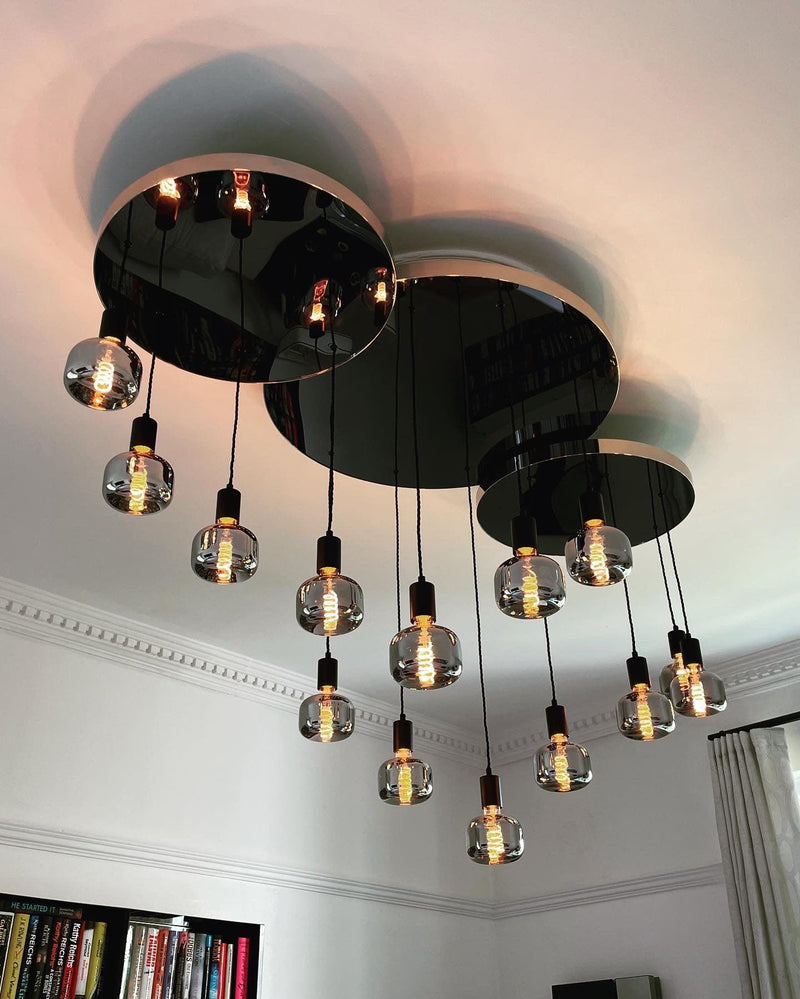 Modern Waves: Stainless Steel Mirrored Chandelier