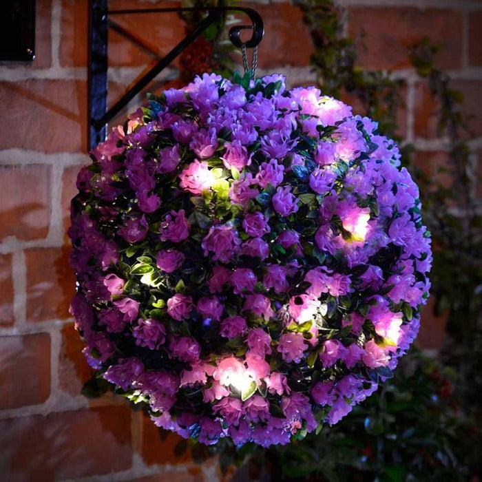 28cm Solar Topiary Ball PURPLE FLOWERTOP-8 AS-11527 - Illuminate your garden with this solar-powered beauty! Automatic dusk activation with dual function: static or flashing.