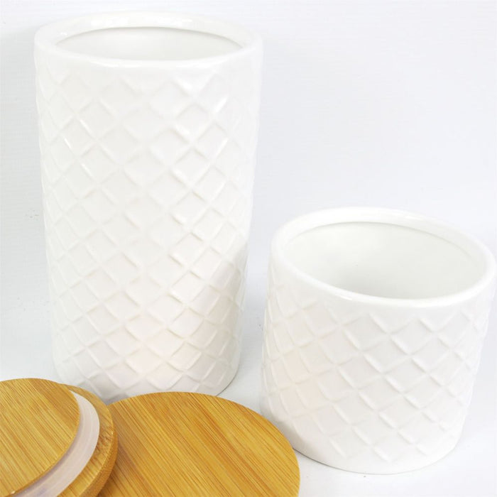 Set of Two Ceramic Jars Embossed Cream Canisters with Lids