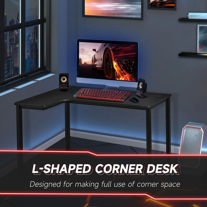 L-Shaped Corner Wood Computer Workstation - Black. Ergonomic, spacious, and durable. Trust the best quality for all your work and gaming needs!