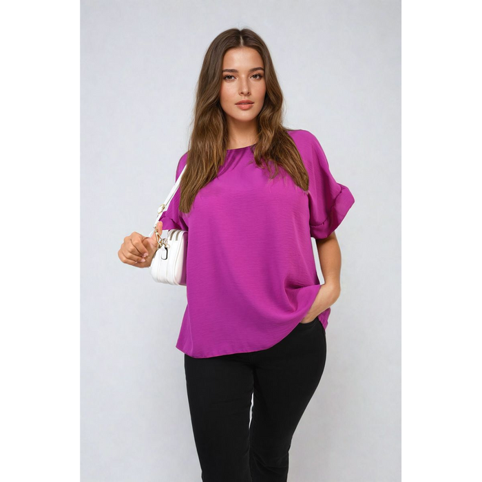 Playful Elegance: Alexandra Frill Sleeve Top - High-quality, versatile and stylish. Elevate your outfit today!