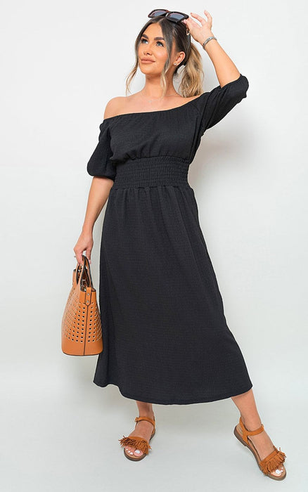 Off Shoulder Shirred Waist Mini Dress: Turn Heads with Effortless Style & Femininity. Perfect for Summer Days/Nights. Various Vibrant Colors. Made from High-Quality Fabric. Dress Up or Down for Endless Possibilities. Be Stylish, Comfortable & Chic.