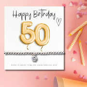 https://images.avasam.com/?url=https://avasamnew.s3.amazonaws.com/live//4322-CD_50th_Birthday_Gold_Balloons_Bracelet_Gift_Women_6a4c0cce-95d7-48ca-93bd-35548f1be419.jpg&w=500