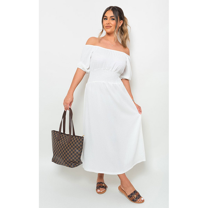 Off Shoulder Shirred Waist Mini Dress: Turn Heads with Effortless Style & Femininity. Perfect for Summer Days/Nights. Various Vibrant Colors. Made from High-Quality Fabric. Dress Up or Down for Endless Possibilities. Be Stylish, Comfortable & Chic.