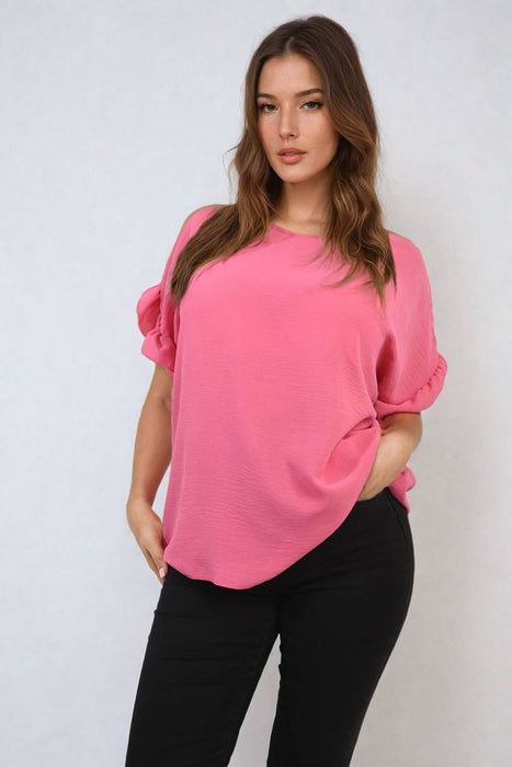 Playful Elegance: Alexandra Frill Sleeve Top - High-quality, versatile and stylish. Elevate your outfit today!