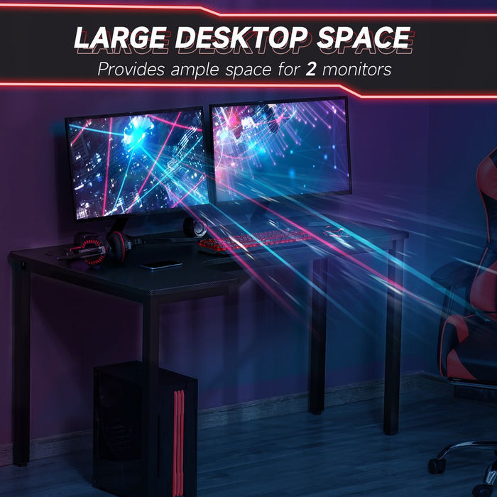 L-Shaped Corner Wood Computer Workstation - Black. Ergonomic, spacious, and durable. Trust the best quality for all your work and gaming needs!