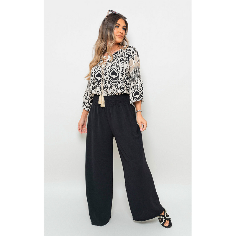 Captivating Boho Prints: Tassel Tie Neck Long Sleeve Tops
