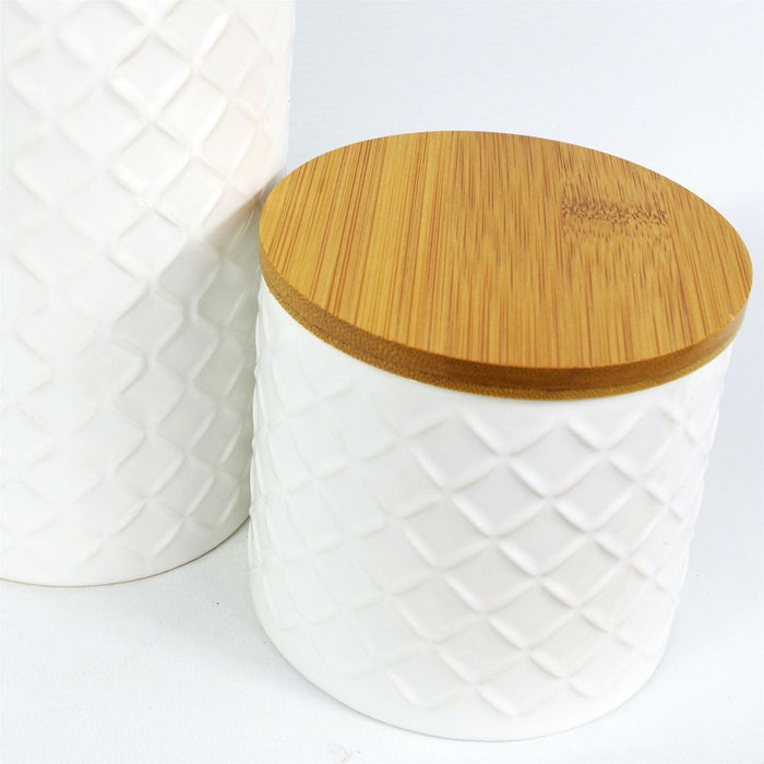 Set of Two Ceramic Jars Embossed Cream Canisters with Lids