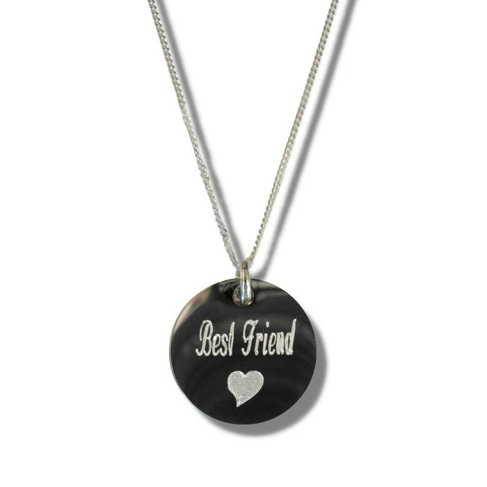 Best Friend Disc Necklace & Heart Symbol" - High-quality stainless steel disc engraved with "Best Friend" and heart symbol. Perfect gift!