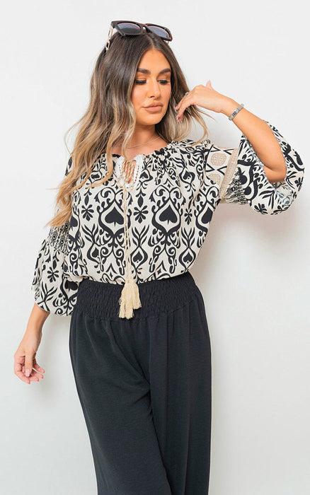 Captivating Boho Prints: Tassel Tie Neck Long Sleeve Tops