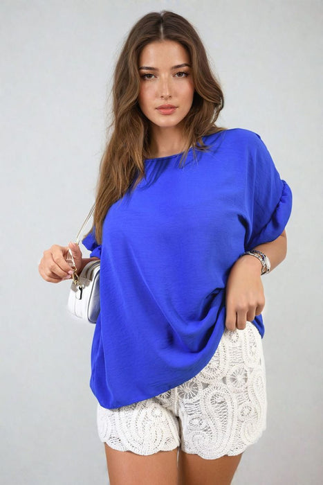 Playful Elegance: Alexandra Frill Sleeve Top - High-quality, versatile and stylish. Elevate your outfit today!