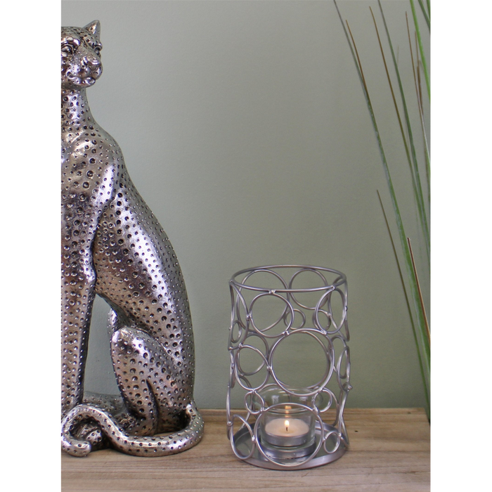 Stylish Silver Metal Abstract Candle Holder - Perfect for Any Home Decor